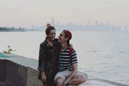 A man out on a date with a lovely Ukrainian woman by the sea.